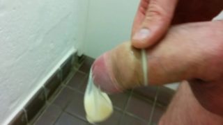 Filling A Condom With Cum In Public Toilet