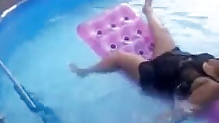 BBW mom falls off a raft in the pool