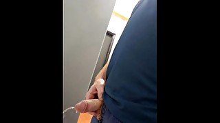 Ginger pissing in public restroom