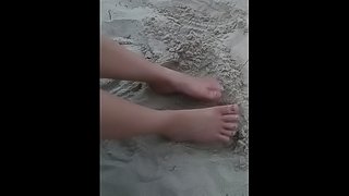 Feet in the sand