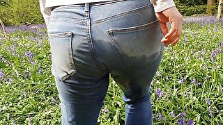 ⭐ Blonde Girl Pissing Her Jeans Amongst The Flowers In Public!