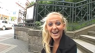 Pretty blonde with a hot body sucking a stranger's big cock in public