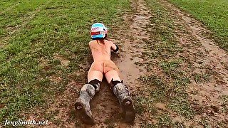 Naked woman riding a Dirt Bike