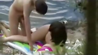 Voyeur tapes nubiles fucking at the lake