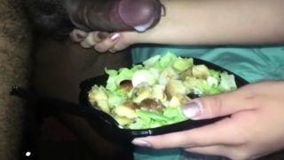 Kinky babe eating her salad with a good dose of fresh cum