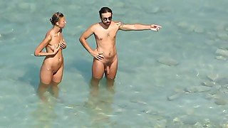 Spy Cam blowjobs on public nude beach