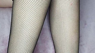 babe in fishnet and plateaus gives Heelsjob/footjob