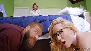 Silicone fuckdoll in high heels pleasuring Xander in bed