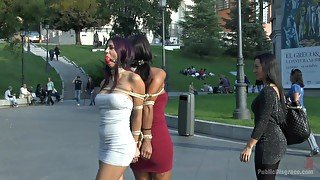 Coral Joice and Julia De Lucia tied up in public with ball gags