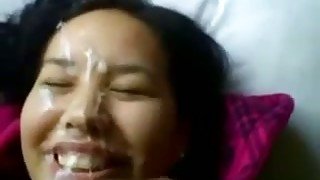 Lewd amateur Asian brunette lets her BF cum on her pretty face