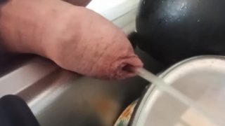 Closeup foreskin pissing on dishes