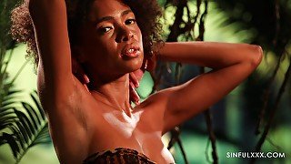 Ebony model Luna Corazon pleasures her tits and puss in solo video