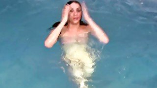 Big ass tranny plays with her massive penis in pool and cums