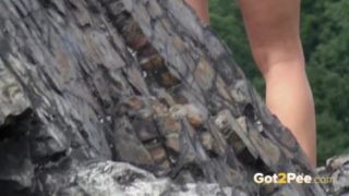 Countryside Pissing - While Out Walking She Takes A Piss