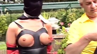 Master takes his latex-loving slavegirl out for a walk