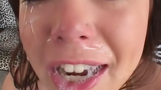 Chubby brunette with great juggs sucking a big black cock