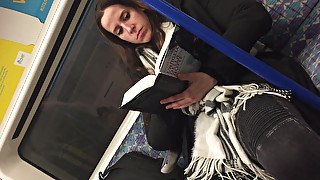 Girl read book in London metro