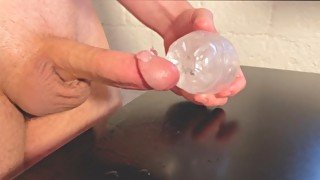 Amateur fucks clear fleshlight & cums on table