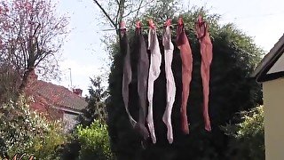 Sexy Milf Nylon Jane teases her stockings legs feet and ass on laundry day in the garden