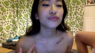 Pretty Oriental teen gets rammed doggystyle and facialized