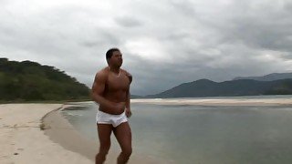 Latino gay guy gets his ass gaped by a hung dude on the beach