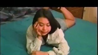 Vintage Asian teen takes it up her hairy twat super hard