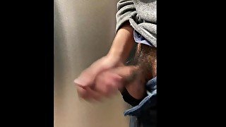 Jerking off at mall restroom stall