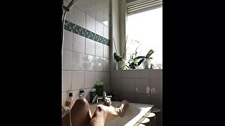 Snapchat story. Cute natural girl takes a bath by the window.