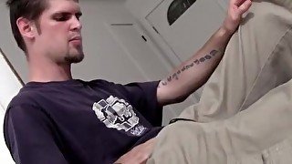 Tattooed chain smoker is stroking his cock for big cum load