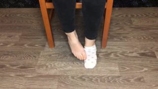 Student girl in white socks show foot and socks pov