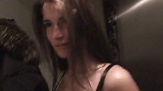 Straight haired amateur brunette provides a dick with a titfuck in small room