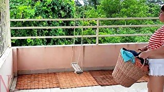 Naked laundry. The maid is drying clothes in the laundry.