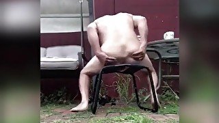 LiveNLove USES ASS SPREADING STOOL TO MASTURBATE OUTDOORS