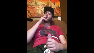 Cum in condom while smoking solo, dripping cum over cock