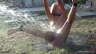 Gorgeous mistress introduces her slave to water play and strap on fuck