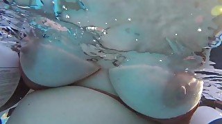 Bettie gets slutty in the pool, takes it from behind (underwater view)