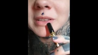Smoking sexy eyes face tattoos