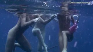 Underwater swimming girls on Tenerife