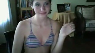 Lengthy webcam chick takes off bikini and masturbates slit