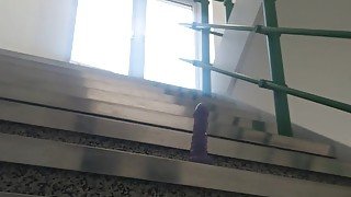 SLUT RIDES IN PUBLIC STAIRWELL AND CUMS ON HIS DILDO