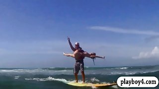 Big boobs babes strip naked and try out surf boarding