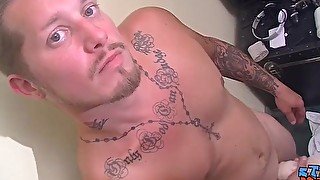 Straight stud with sexy tatts making his hard cock spray cum