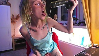 VERY SLOPPY SUCKING A BIG BLACK DILDO