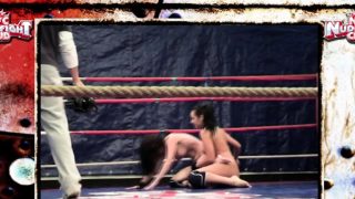 Dyke babes wrestle naked in a boxing ring