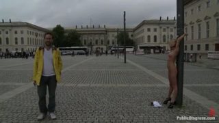 Mellow blond Paris Pink having a real BDSM experience in public place