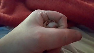 Quick wank of small dick and tasting cum, close up of cum oozing out of foreskin