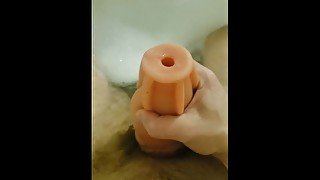 Sloppy Fleshlight Play in bathtub with explosive cumshot