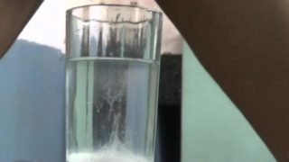 Dude cumming in a glass of water