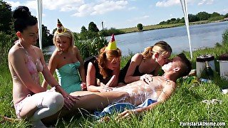 Outdoor fucking by the lake with dirty sluts that love to eat cum