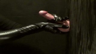 long Black gloves handjob at the gloryhole